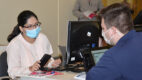 A new Albany Medical College resident works with an Albany Med IT professional to get set up in the Albany Med computer systems.