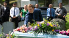 An Albany Medical College student places flowers on the casket to pay tribute to more than 200 people who died and donated their bodies to the College’s Anatomical Gift Program for medical education.