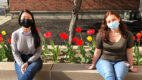 Annette Kaminaka, left, and Alyssa Galloway FGLIMed student group members recruiting mentors for the class of 2025