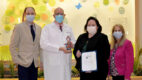 From left, Justin Ferguson, Lions Eye Bank director of clinical services, Dr. Deroo, and Lions Eye Bank Executive Director Vicki Adler and Director of Hospital Development/Events Joann Beach.