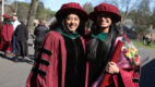 2 Albany Medical College graduates pose with each other for a photo at SPAC at the 184th Commencement for Albany Medical College