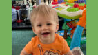 Greyson Clark, 1, smiling for the camera was treated at Albany Med's Pediatric Wound Clinic.