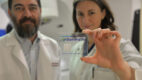 Albany Medical Center’s Dr. Alexandra Paul, pictured with Dr. Edward Farhangi, holds a GammaTile, a new tool used to deliver surgically targeted radiation therapy to brain tumors.