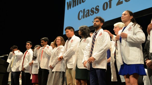 Medical students don their white coats for the first time at the Class of 2028 White Coat Ceremony