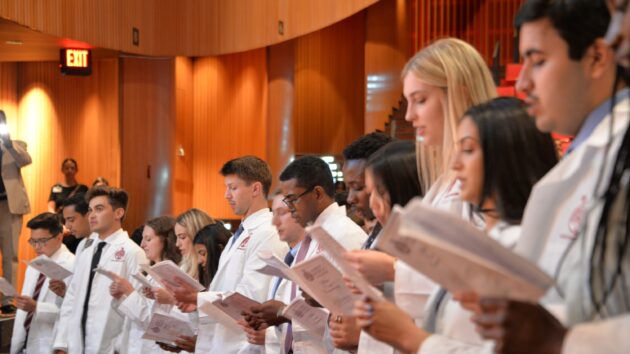 Medical students recite the Declaration of Geneva at the Class of 2028 White Coat Ceremony