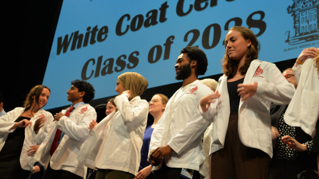 Medical students don their white coats for the first time at the Class of 2028 White Coat Ceremony